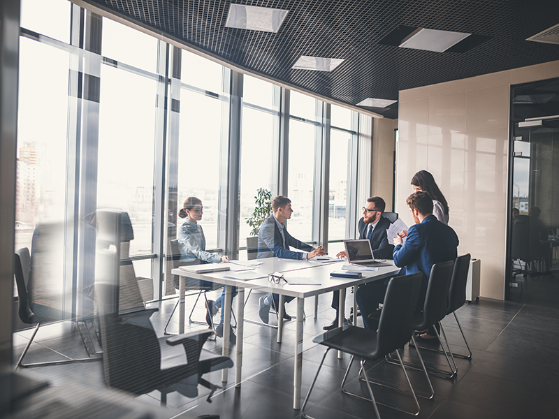 Corporate business team and manager in a meeting