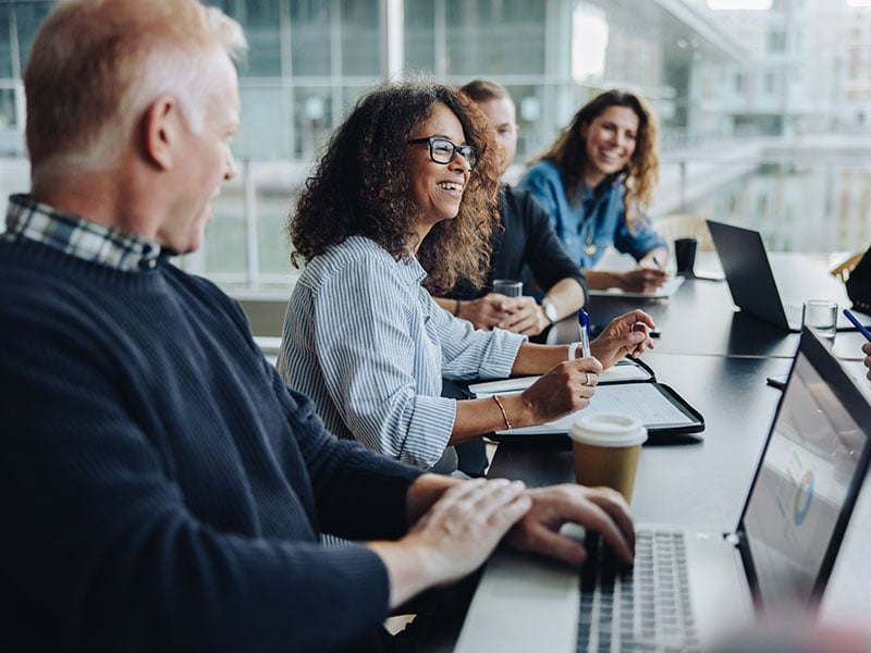 Smiling client at a meeting in a conference room