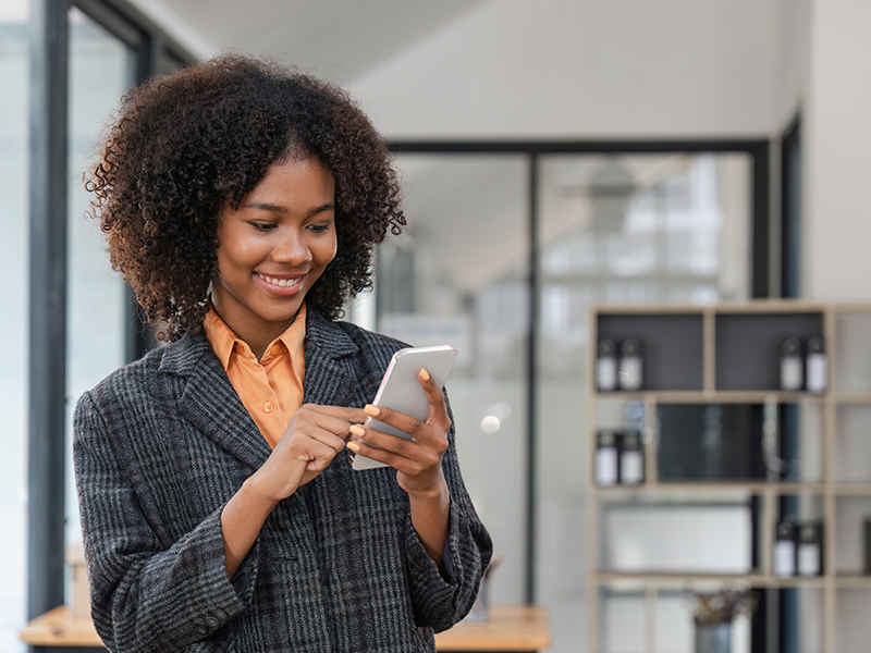 Business woman on her mobile phone