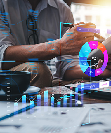 various bar and pie charts overlaying an image of a man working