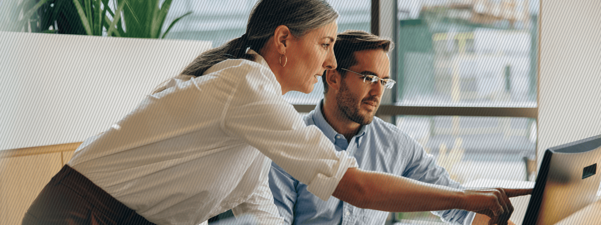 A manager reviewing metrics with her employee