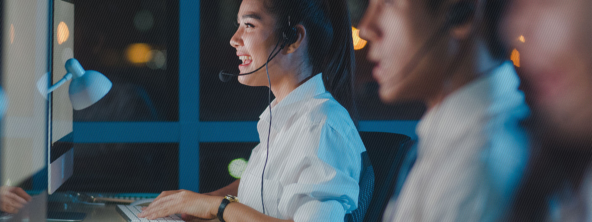 contact center employees at their desk