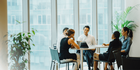 corporate employees at a table