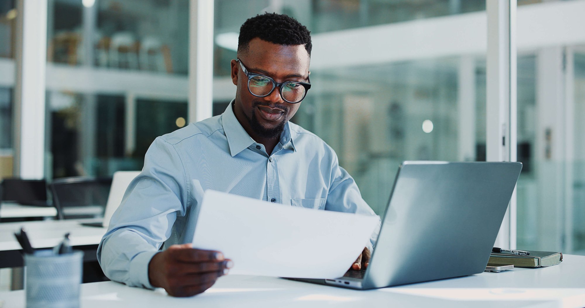 Male professional reviewing data