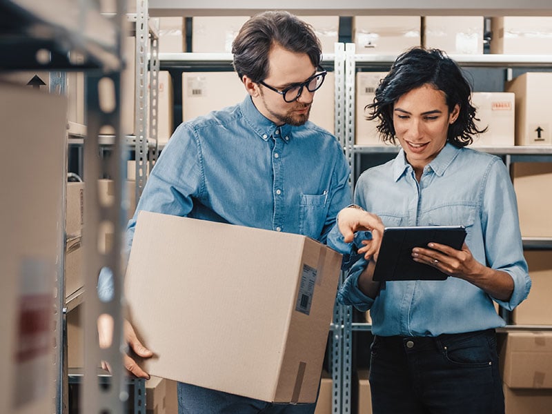 Retail employees preparing a delivery