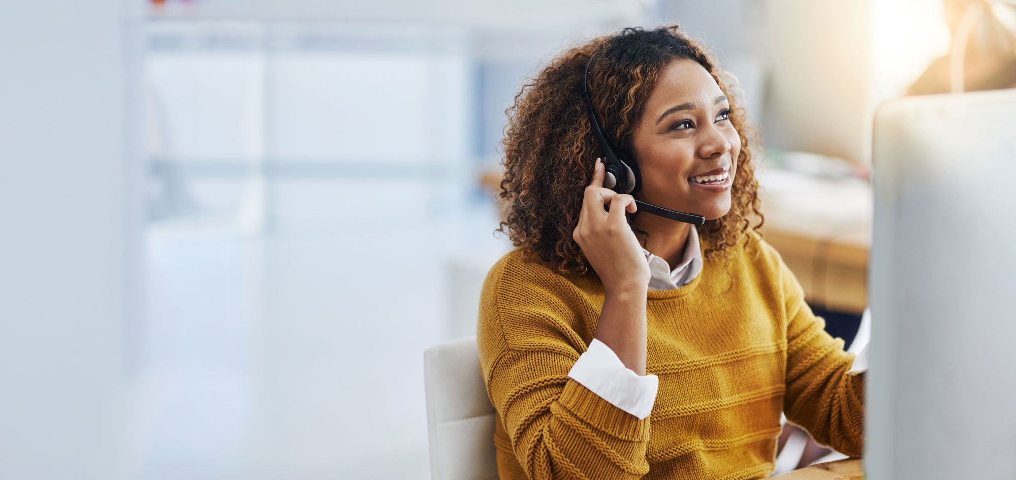 Woman wearing a telephone headset