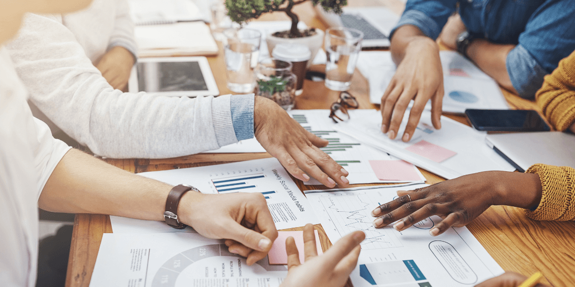 Co-workers analyzing customer feedback to drive business growth