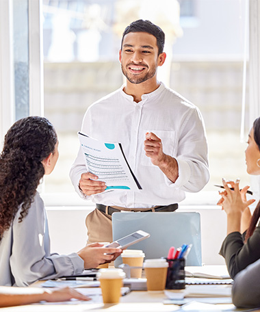 An employee presenting during a meeting