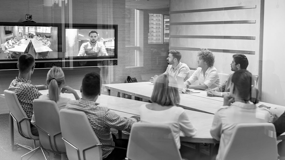 Business people in video conference meeting
