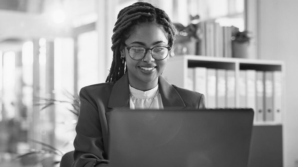 Woman in office for online research